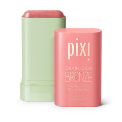 Pixi On-the-Glow Bronze WarmGlow stick applied to cheek for natural glow