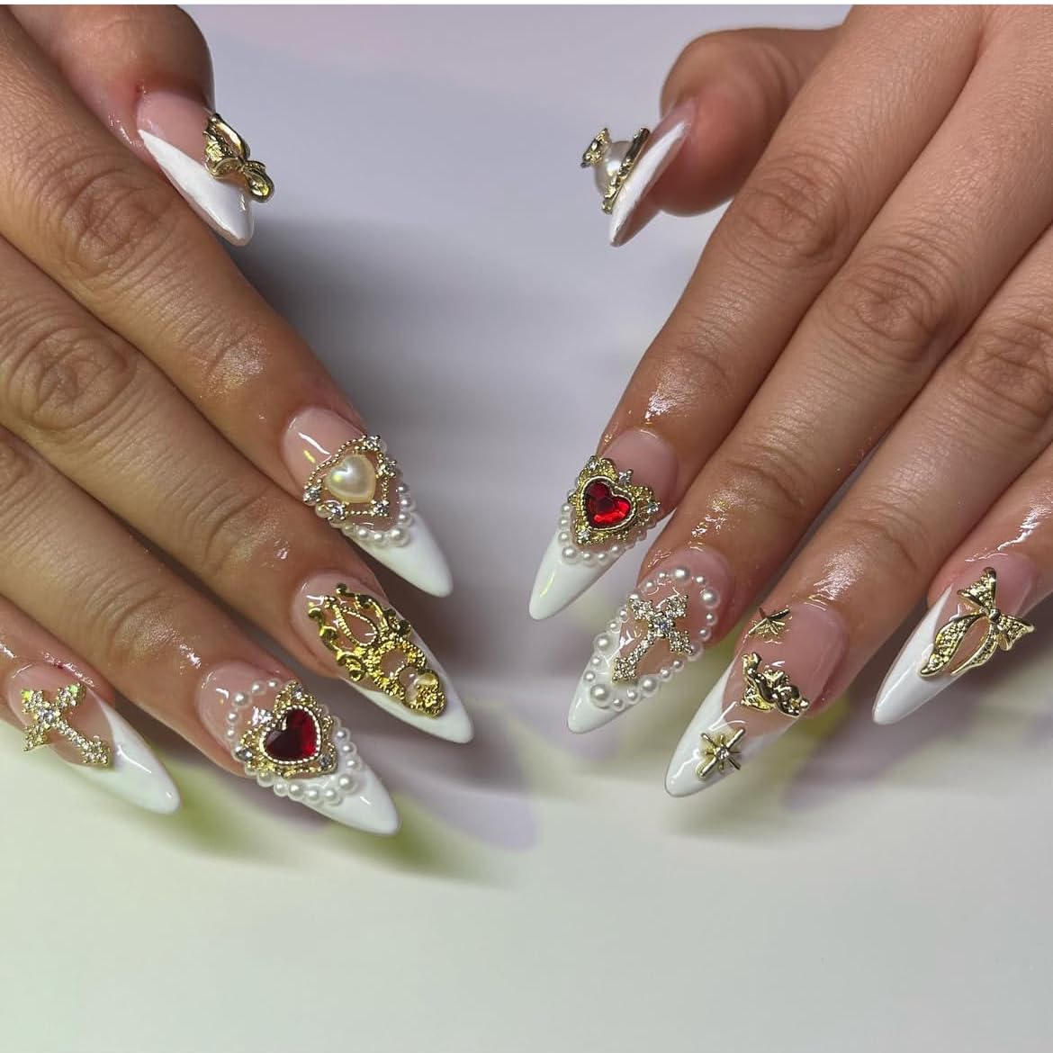 Pizadix gold bow charm adds chic detailing to nails