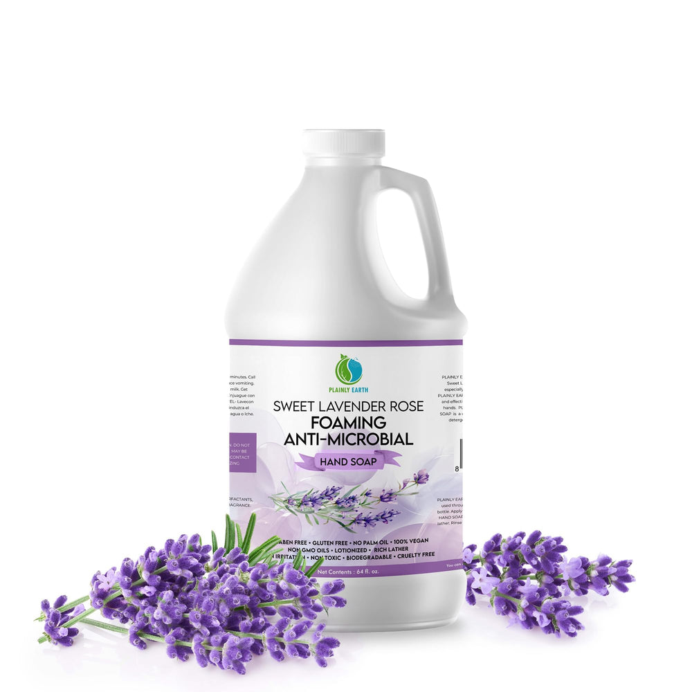 Plainly Earth antimicrobial hand soap bottle pouring for quick hand hygiene.