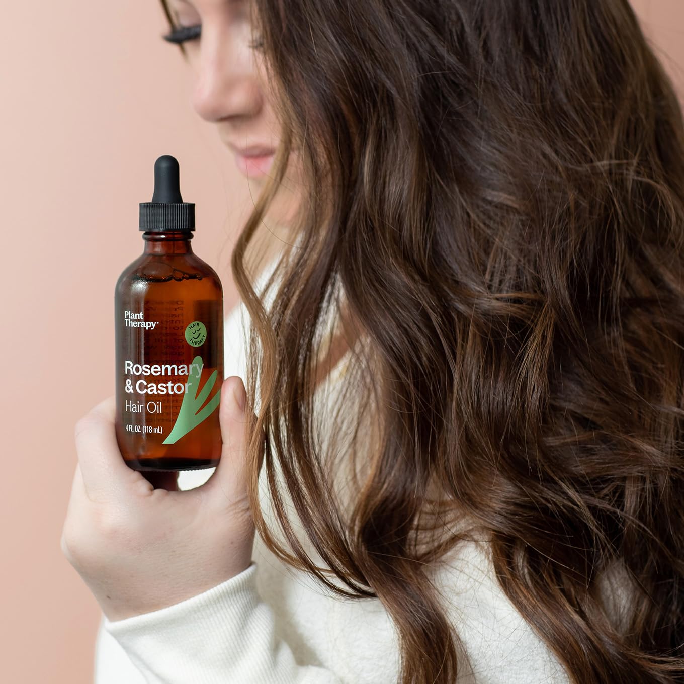 Plant Therapy hair shine close-up showing smooth, frizz-free strands.