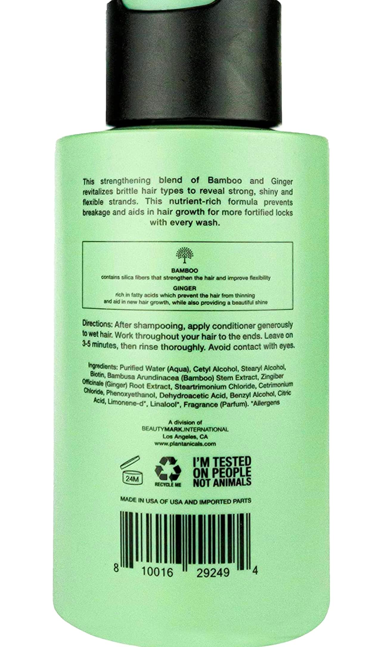 Closeup of Plantanicals conditioner bottle label featuring bamboo and ginger for daily conditioning.