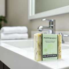 Close-up of peppermint leaves with soap highlighting a refreshing morning aroma
