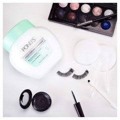 POND'S Cold Cream Cleanser cream texture close-up for luxurious cleansing.