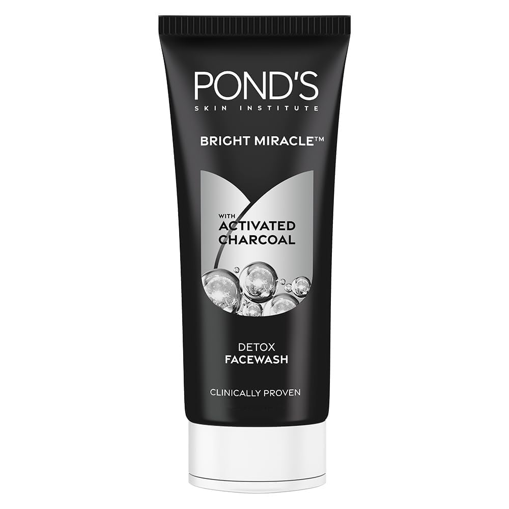 Pond's Pure White Facial Foam bottle pour shows activated carbon cleansing effect.