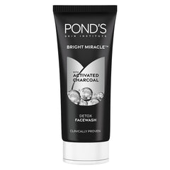 Pond's Pure White Facial Foam bottle pour shows activated carbon cleansing effect.
