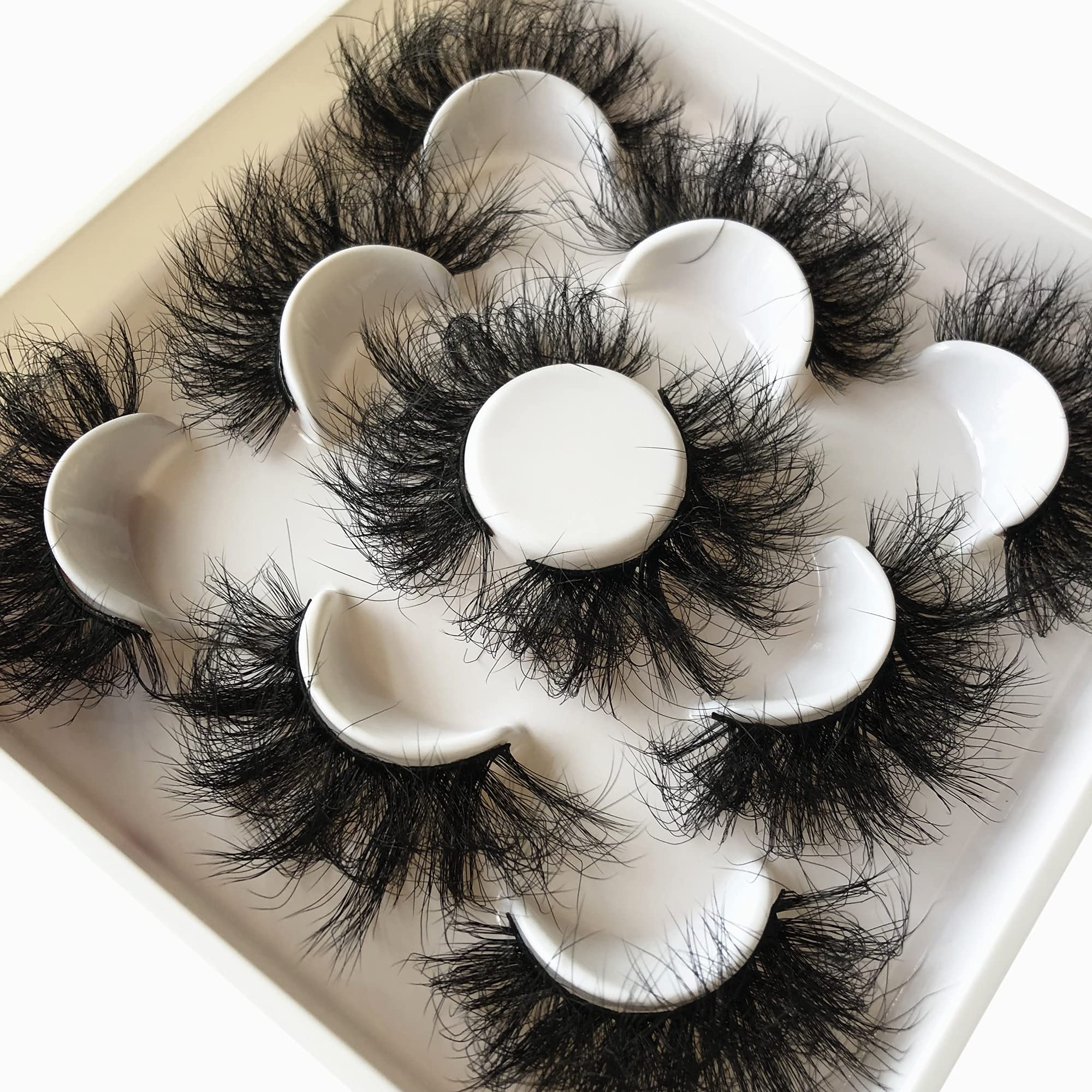 Pooplunch 8D handmade lashes closeup, multi-layered fullness with natural curls.