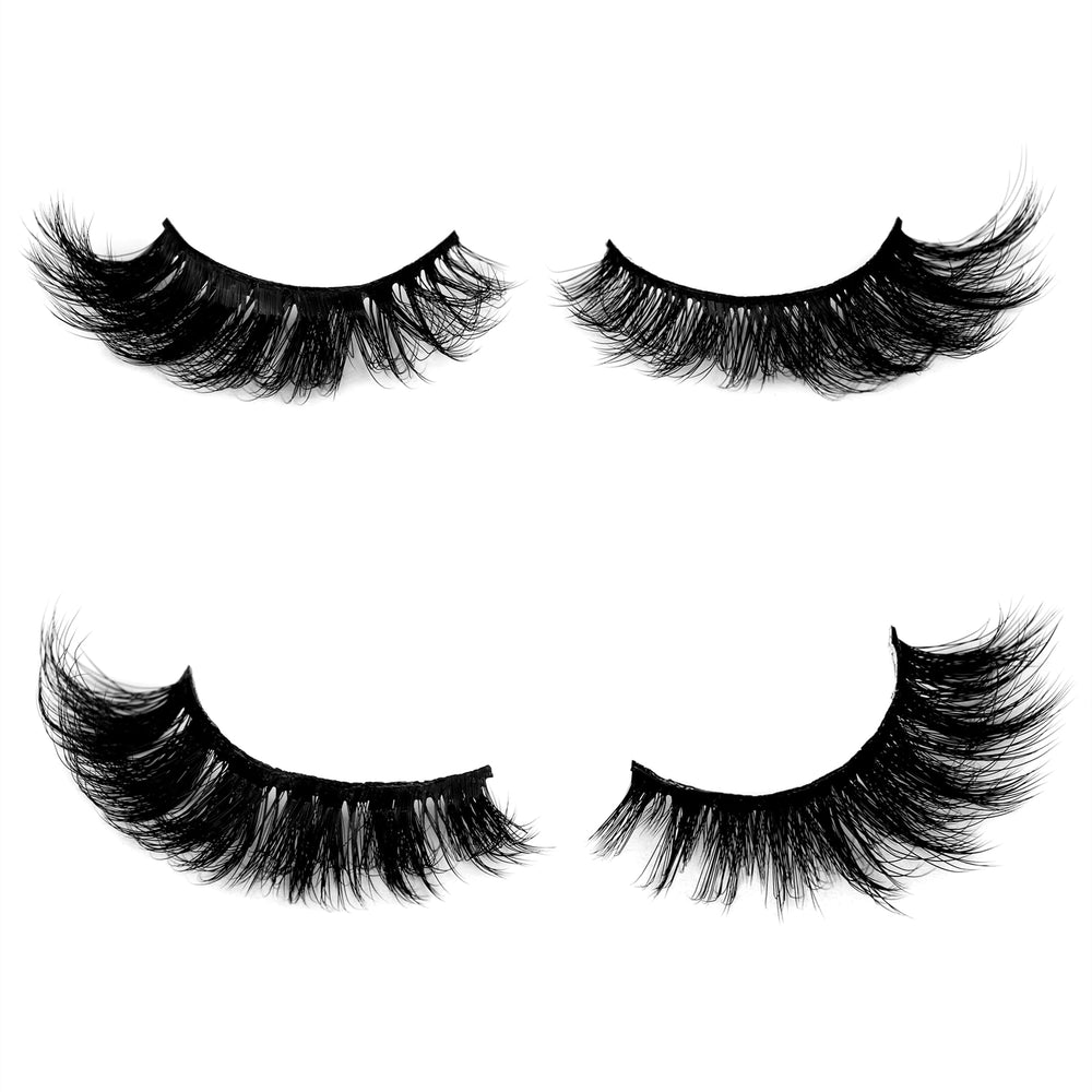 Pooplunch crossed dramatic lashes deliver fluttery definition and impact.