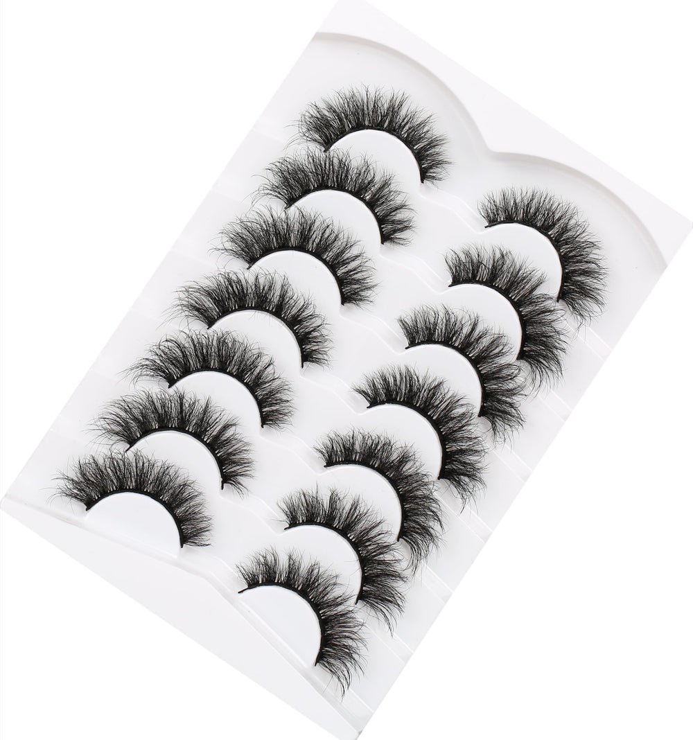 Pooplunch full-volume crossed lashes adding bold drama and deep eye contour