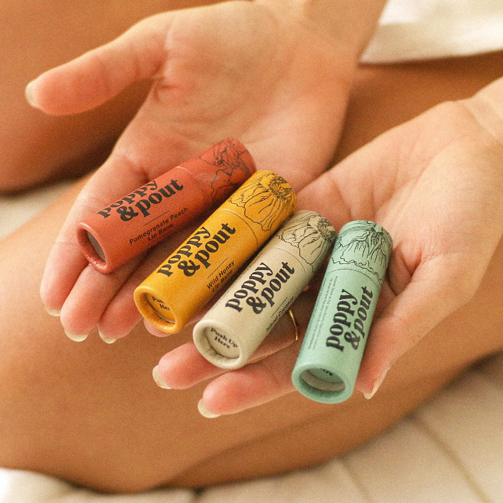 Recyclable cardboard tube from Poppy & Pout packaging for eco-conscious shoppers.