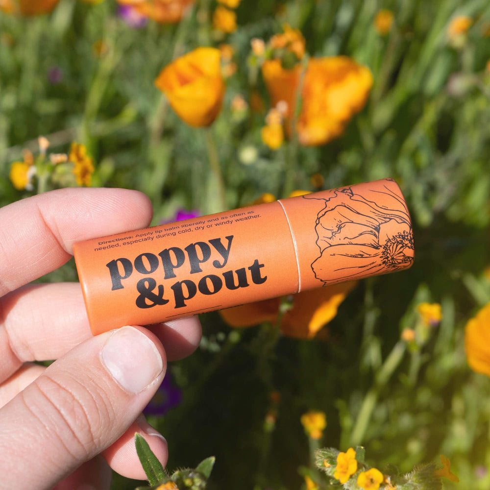 Poppy & Pout balm creamy texture delivering long-lasting moisture.