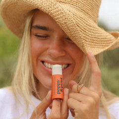 Poppy & Pout Organic ingredients like coconut oil and beeswax powering natural lip care.
