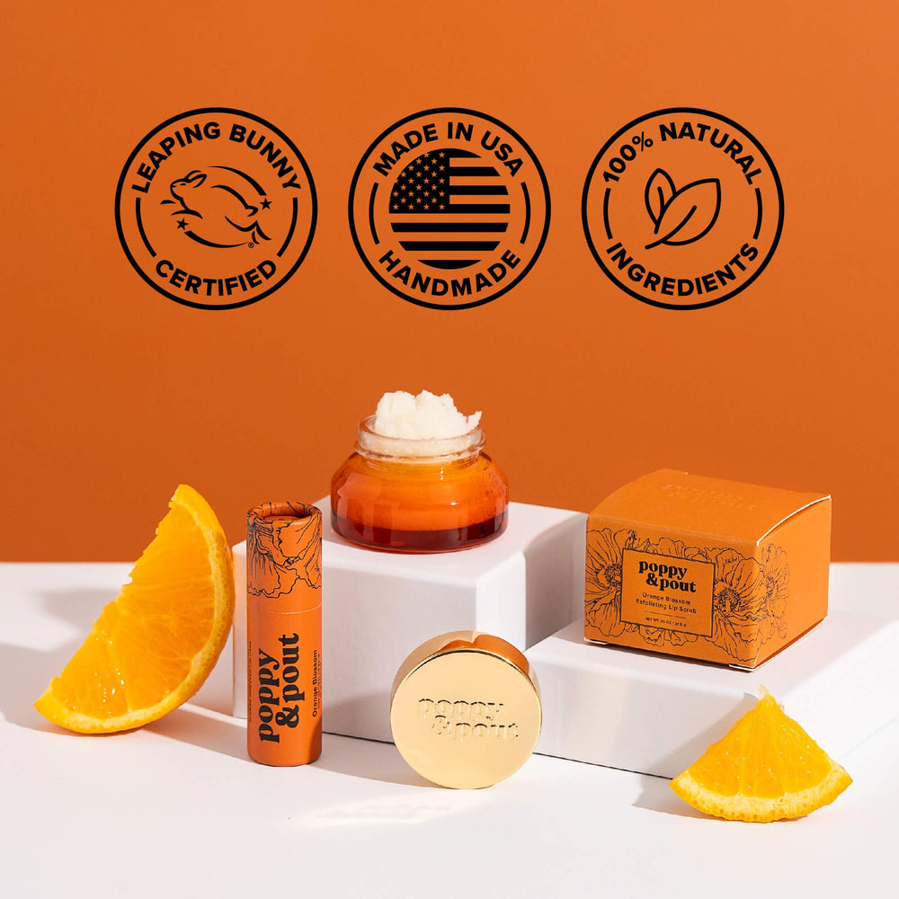 Poppy & Pout Orange Bloom recyclable cardboard tube showcased.