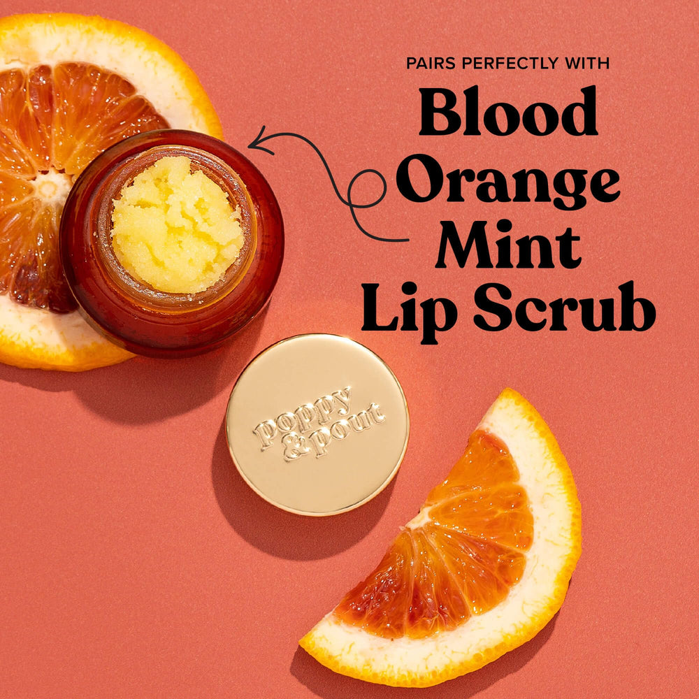 Product swatch with minty color hints beside the tube.