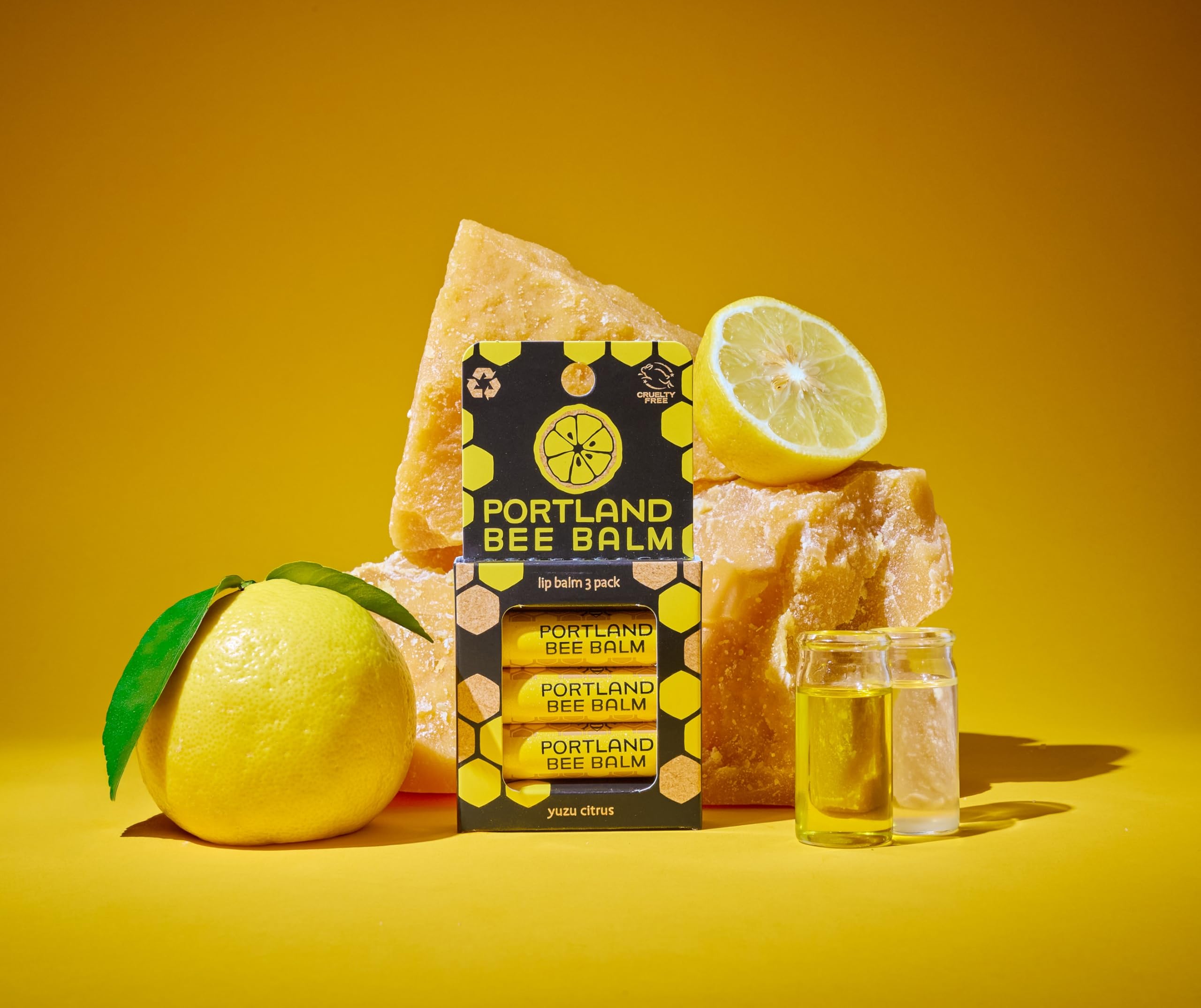 Portland Bee Balm Yuzu Citrus beeswax close-up, protective natural barrier for lips.