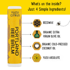 Portland Bee Balm Yuzu Citrus ingredients glass bottle close-up, featuring organic oils for moisture.