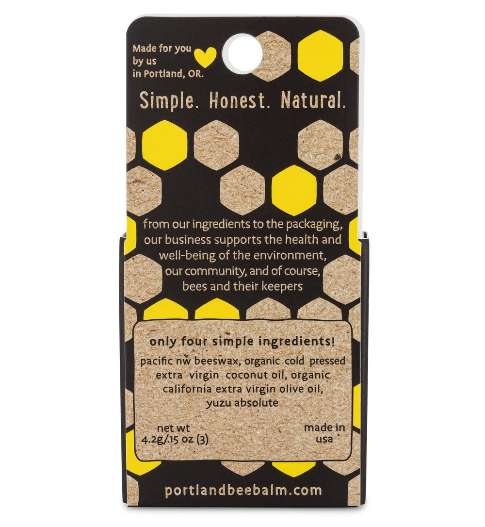 Portland Bee Balm Yuzu Citrus packaging side, cruelty-free lip care branding.
