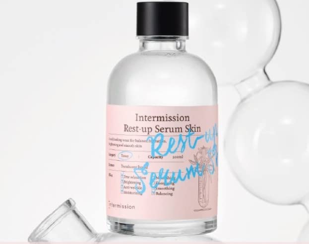 Pousutong Intermission Rest Up Serum dropper releasing a precise dosage for controlled use