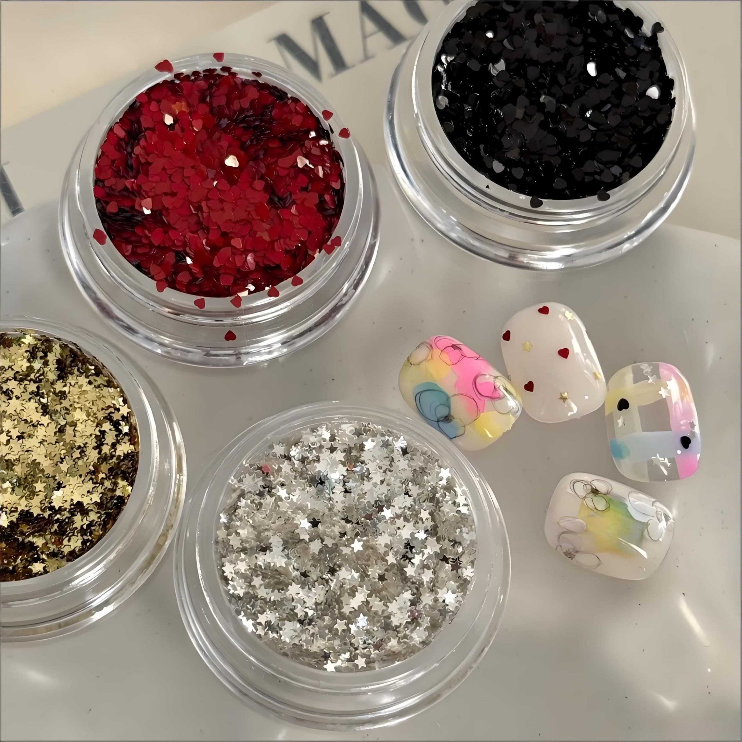 PowPop 3D heart and star nail flakes in gold and silver for eye-catching details.