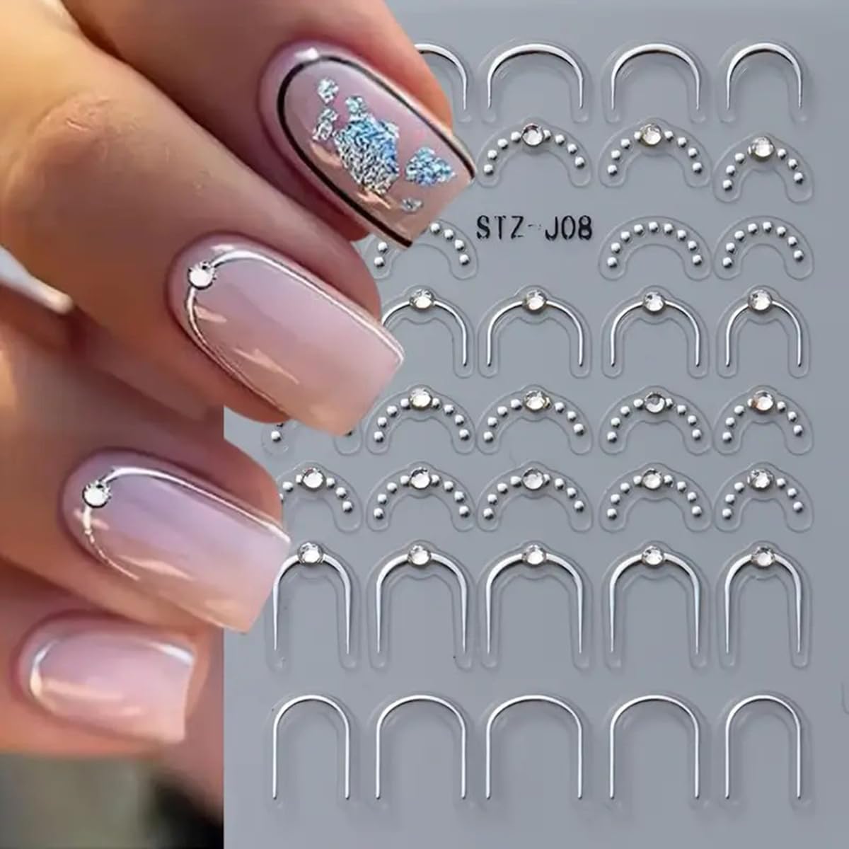 POWPOP bow-tie marble French nail design for stylish manicure.