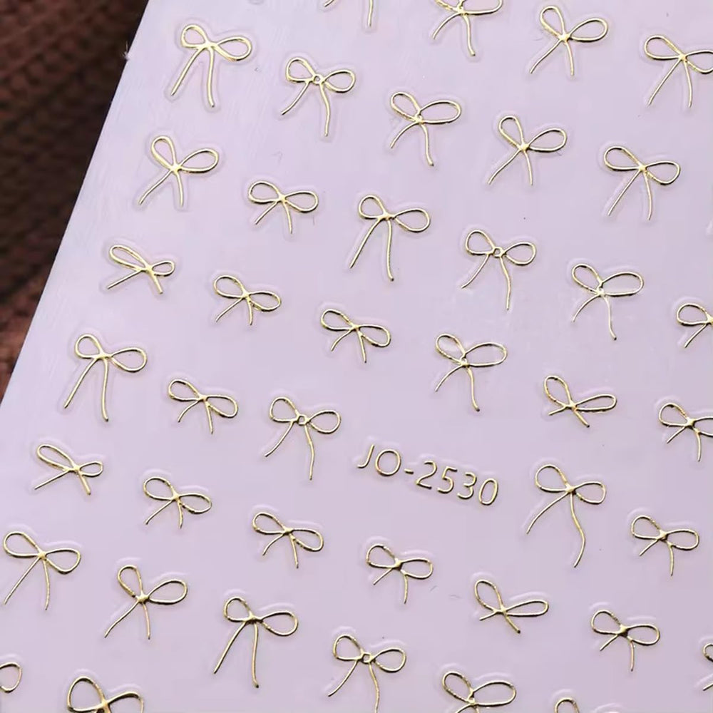 Powpop butterfly decals add delicate detail to natural or gel nails.