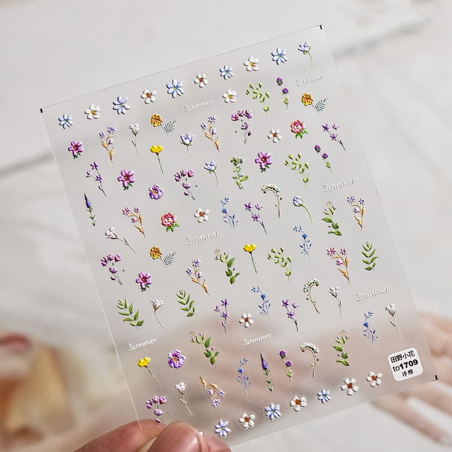 PowPop embossed floral decals create a tactile, premium look for natural or artificial nails.