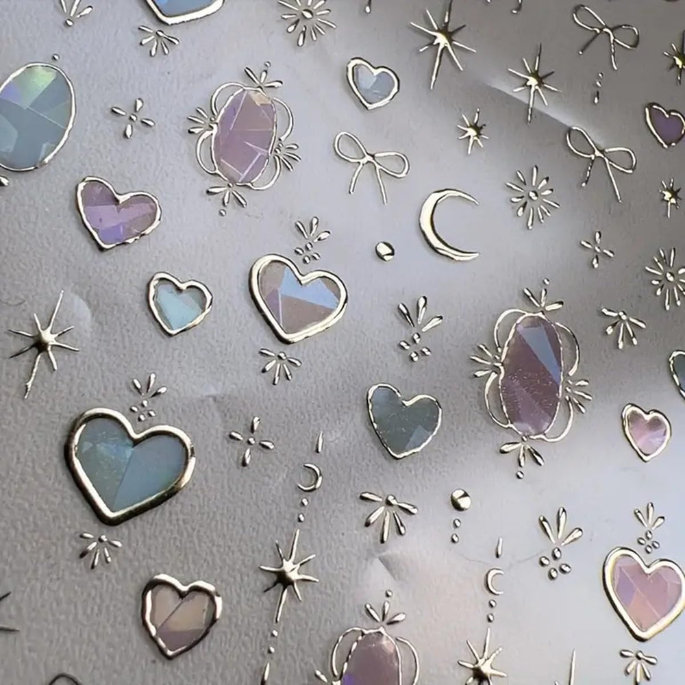 POWPOP Heart Moon nail stickers feature embossed gold stars for a luxe 3D manicure.