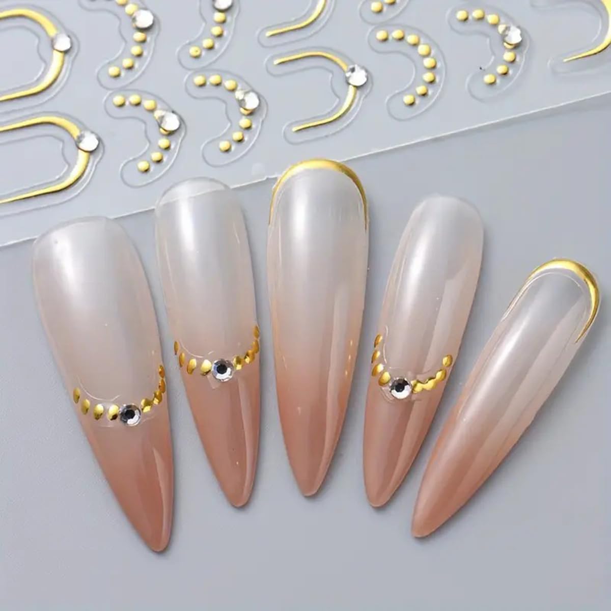 POWPOP rhinestone embellishments add sparkle for special occasion nails.