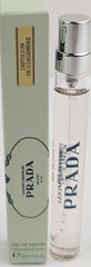 Prada Les Infusions Ginger EDP travel spray bottle, portable citrus-woody aroma.