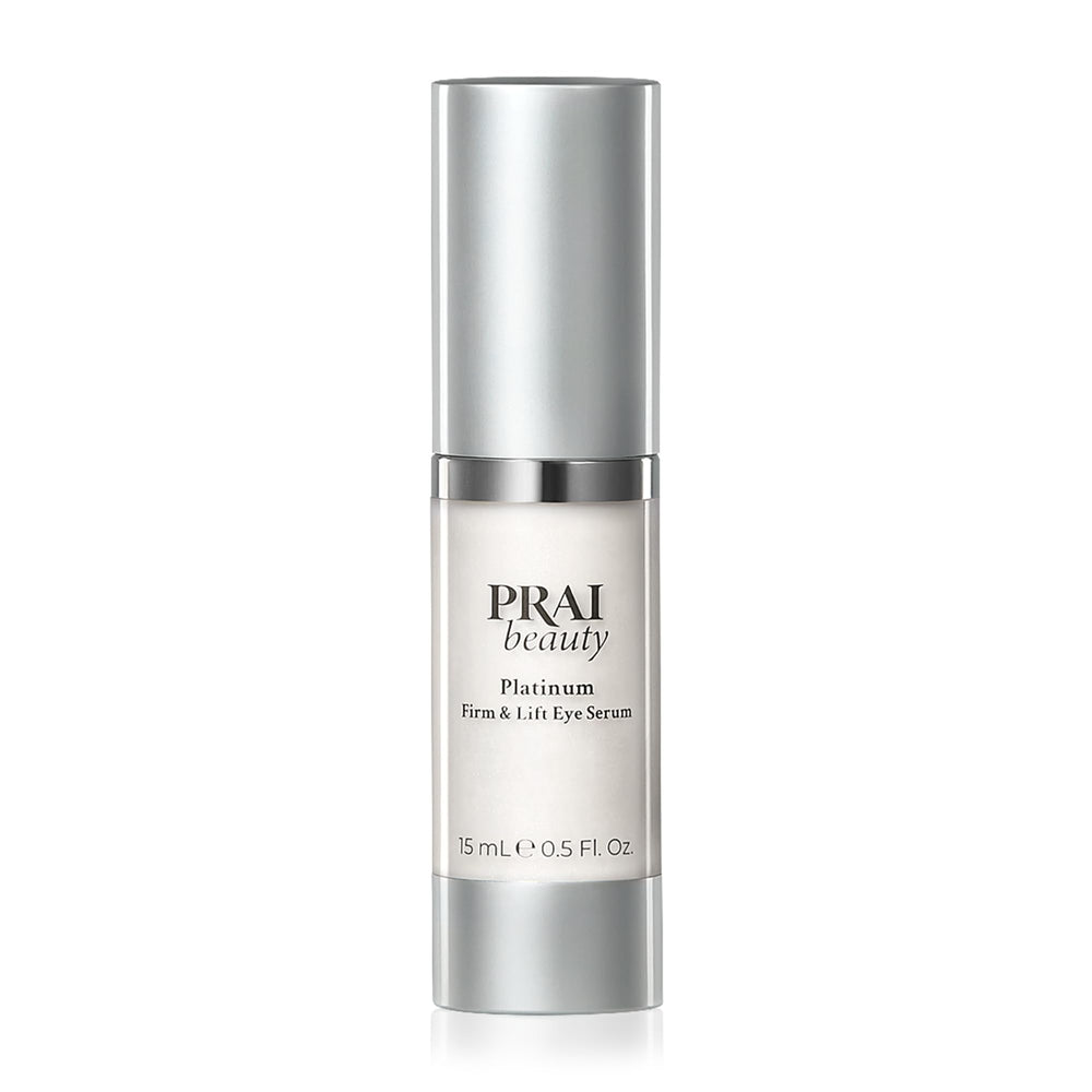 PRAI Beauty Platinum Firm and Lift Eye Serum bottle showcases premium firming formula for under-eye skin