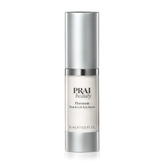 PRAI Beauty Platinum Firm and Lift Eye Serum bottle showcases premium firming formula for under-eye skin