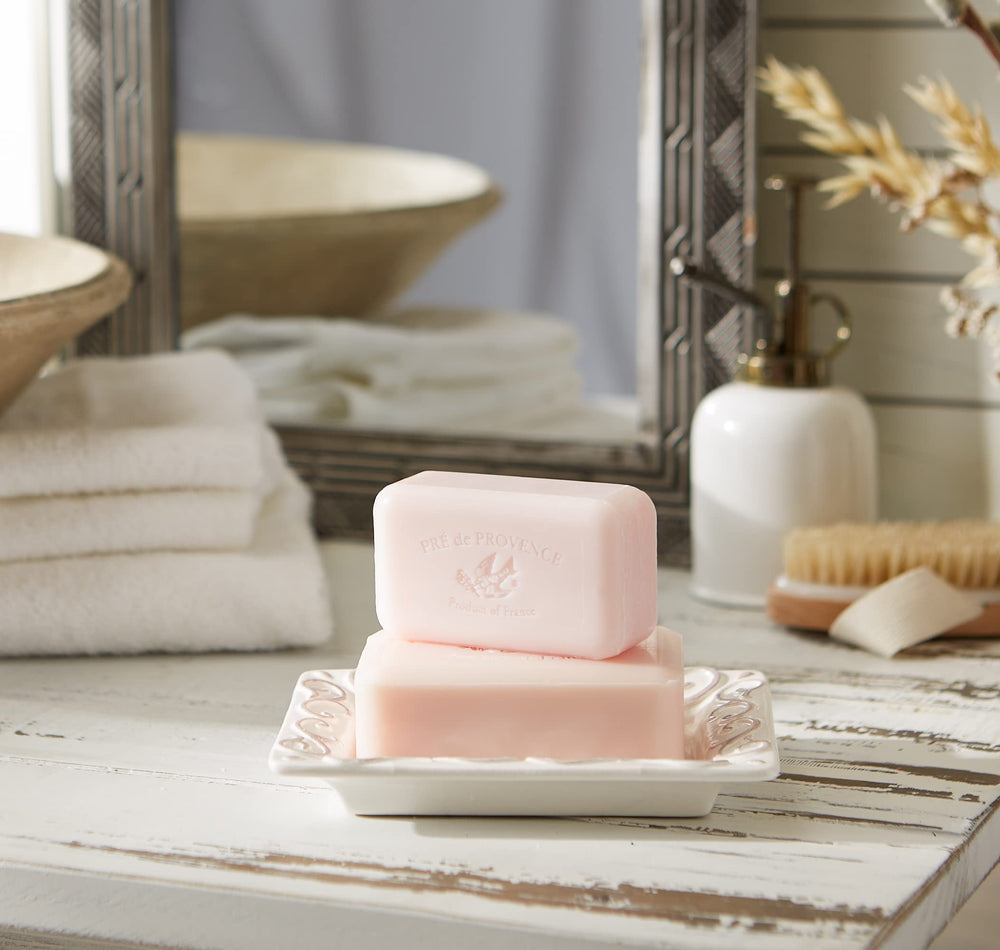 Lily of the Valley fragrance from Pre de Provence fills the bathroom subtly.