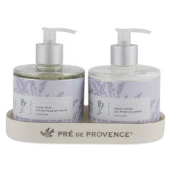 User applying Pre de Provence Shea Butter Hand Lotion for daily nourishment.