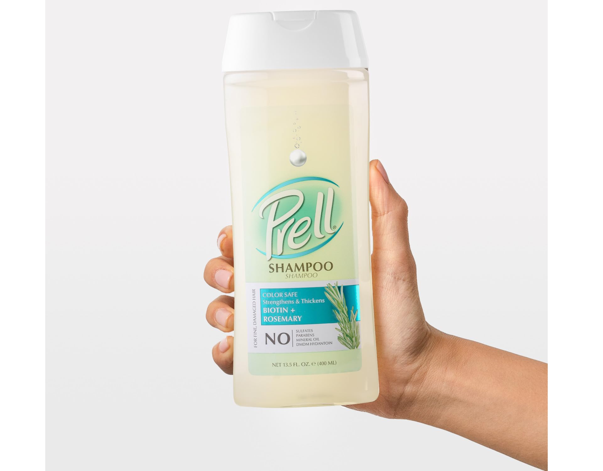 Prell Biotin Rosemary Shampoo label close-up highlights sulfate- and parabens-free formula