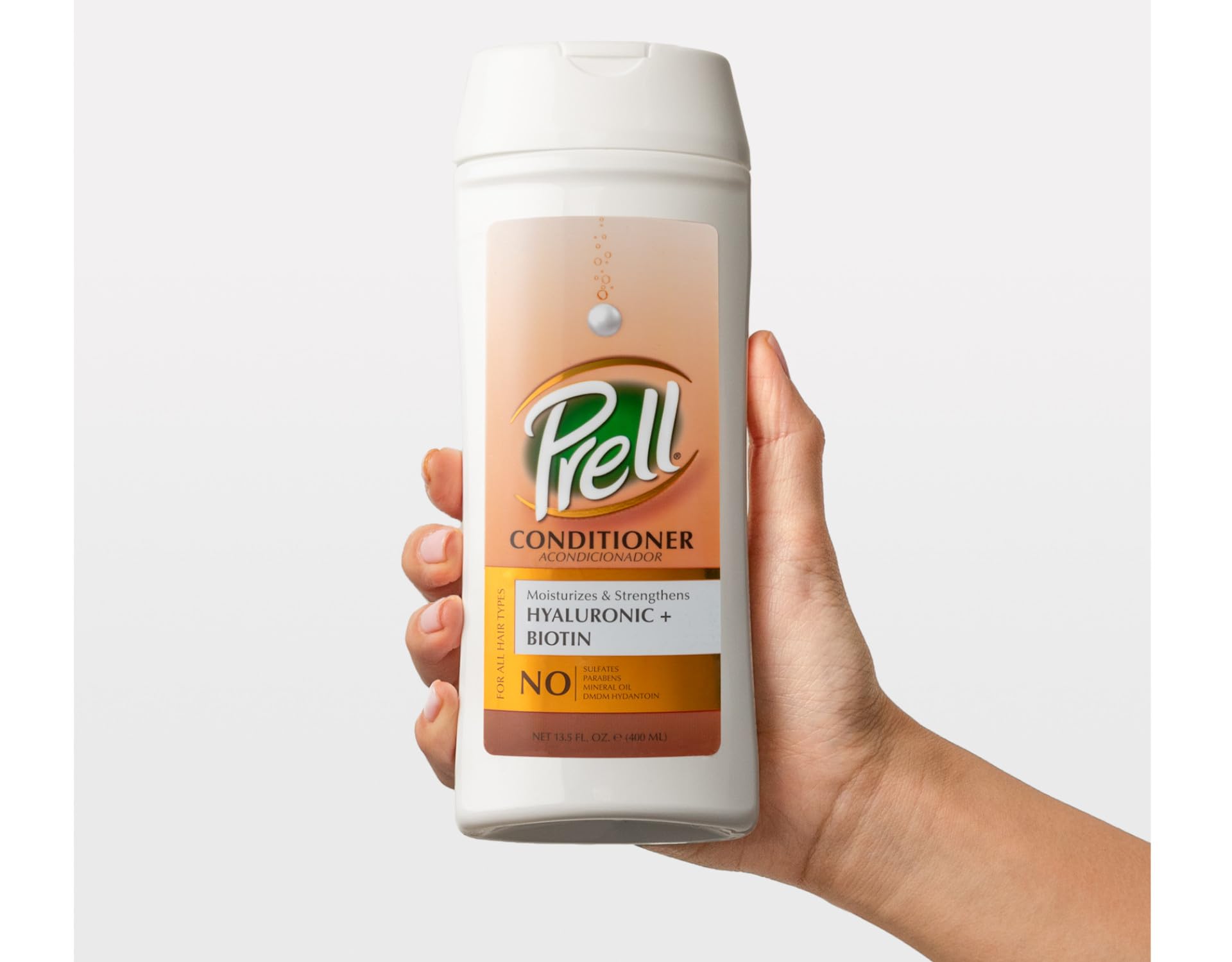 Close-up of Prell Conditioner label communicates hydration and manageability