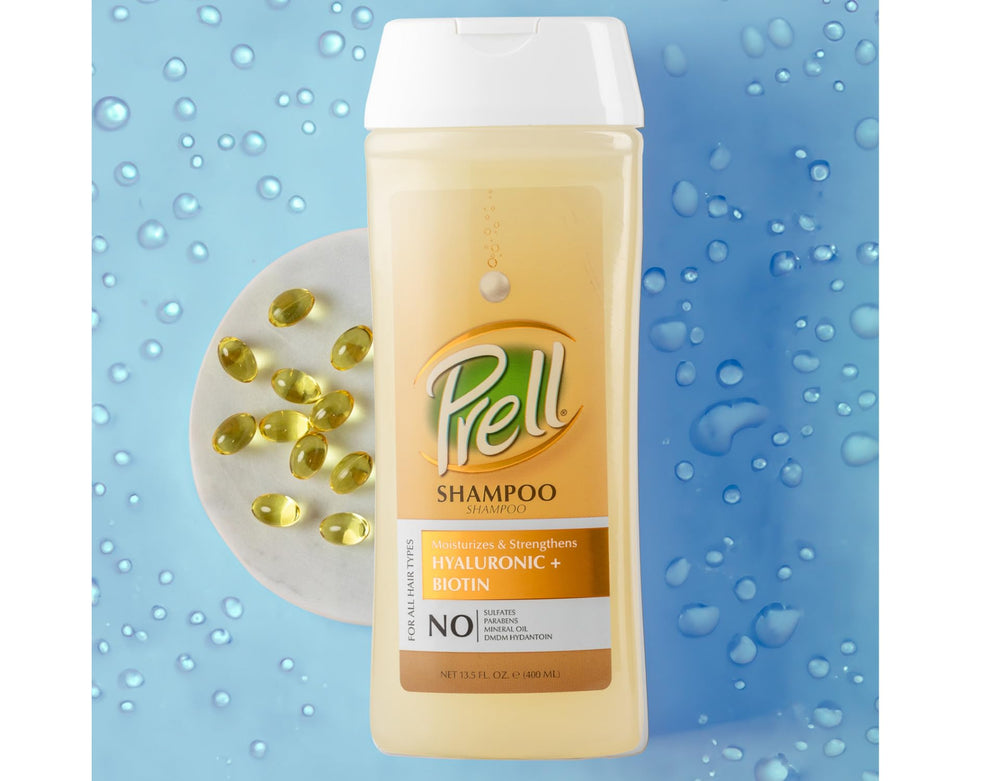 Close-up of Prell Shampoo label featuring hyaluronic acid and biotin