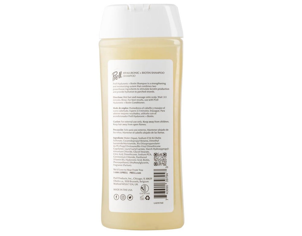 Hand applying Prell Hyaluronic + Biotin Shampoo in shower for cleansing
