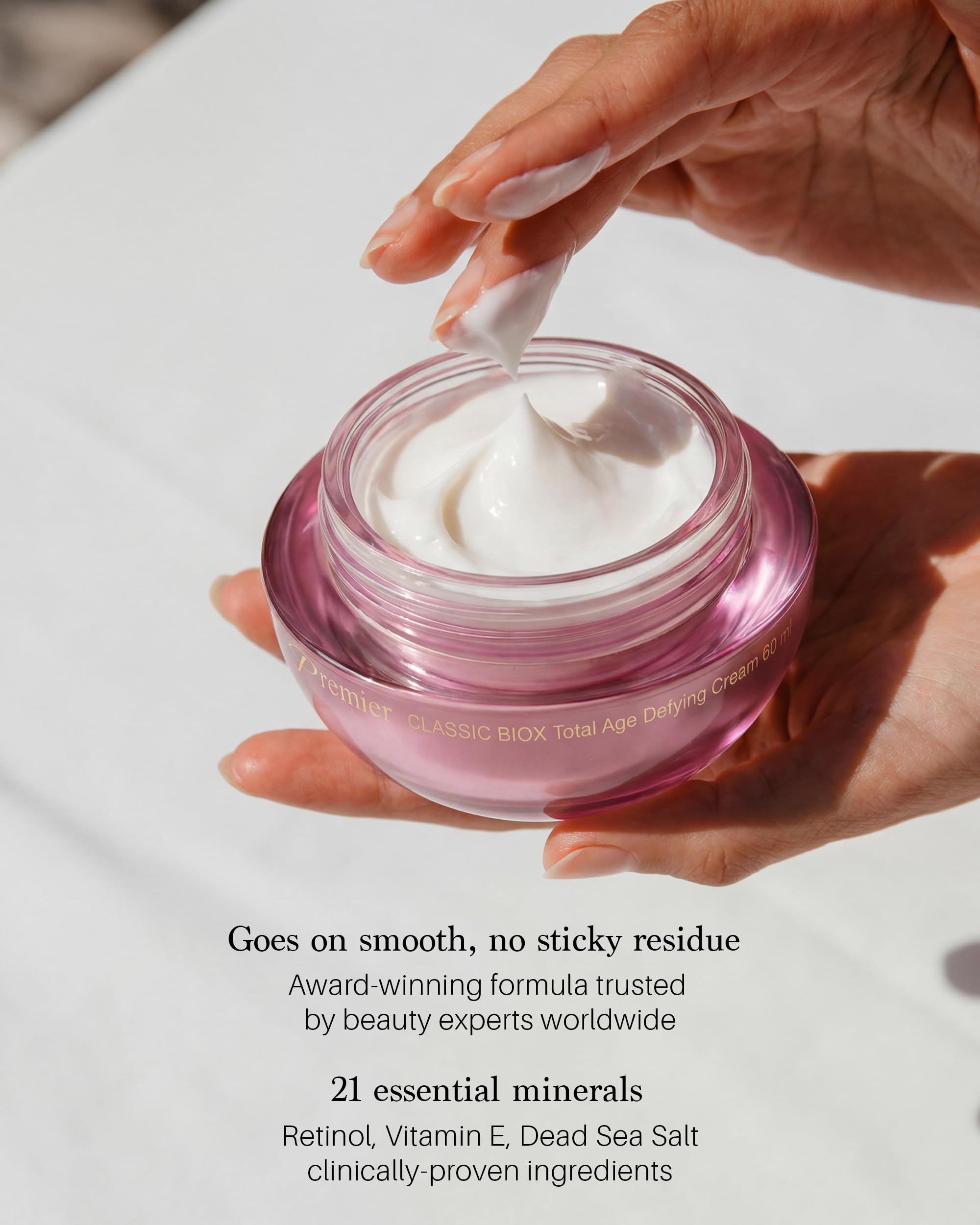Premier BIOX cream beside makeup demonstrating long-lasting hydration under foundation