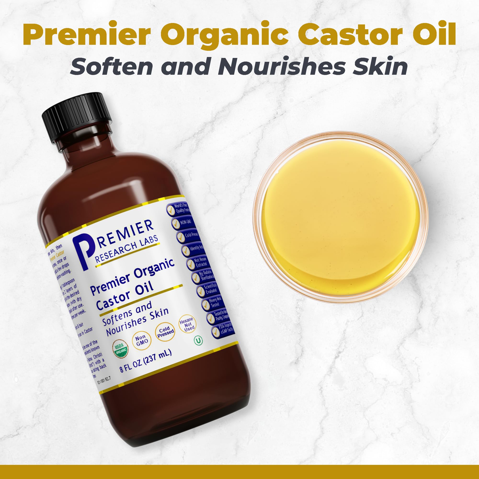 Premier Research Labs cold-pressed castor oil bottle on vanity for hair nourishment.