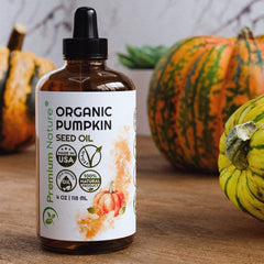 Premium Nature Pumpkin Seed Oil bottle used in hair growth routine.