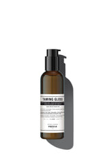 Previa Hair Gloss bottle pouring, showing easy application and frizz control.