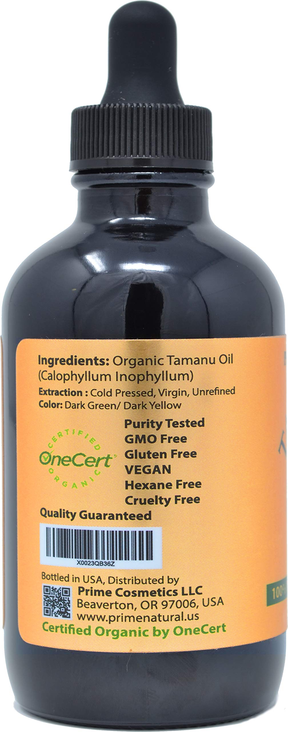 Close-up of PRIME NATURAL Tamanu oil amber bottle highlighting purity and organic certification.