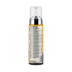 Pro Tan Two Minute Tan mousse application highlights even coverage and bronze color.