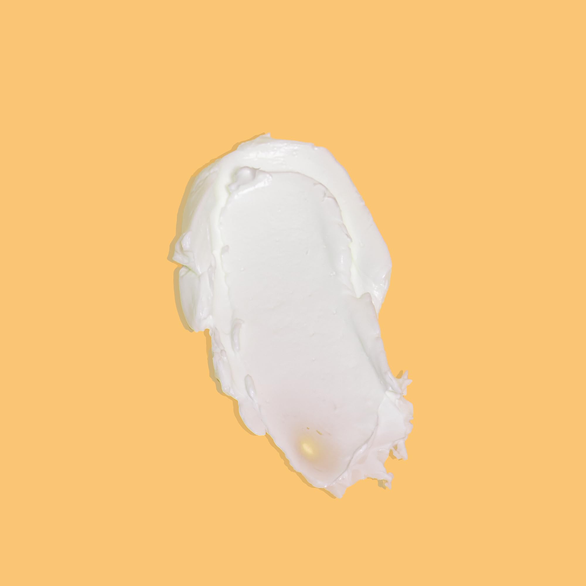 PROUDLY Ultra-Rich Body Butter tub with spread, showing creamy texture for all-day moisture.