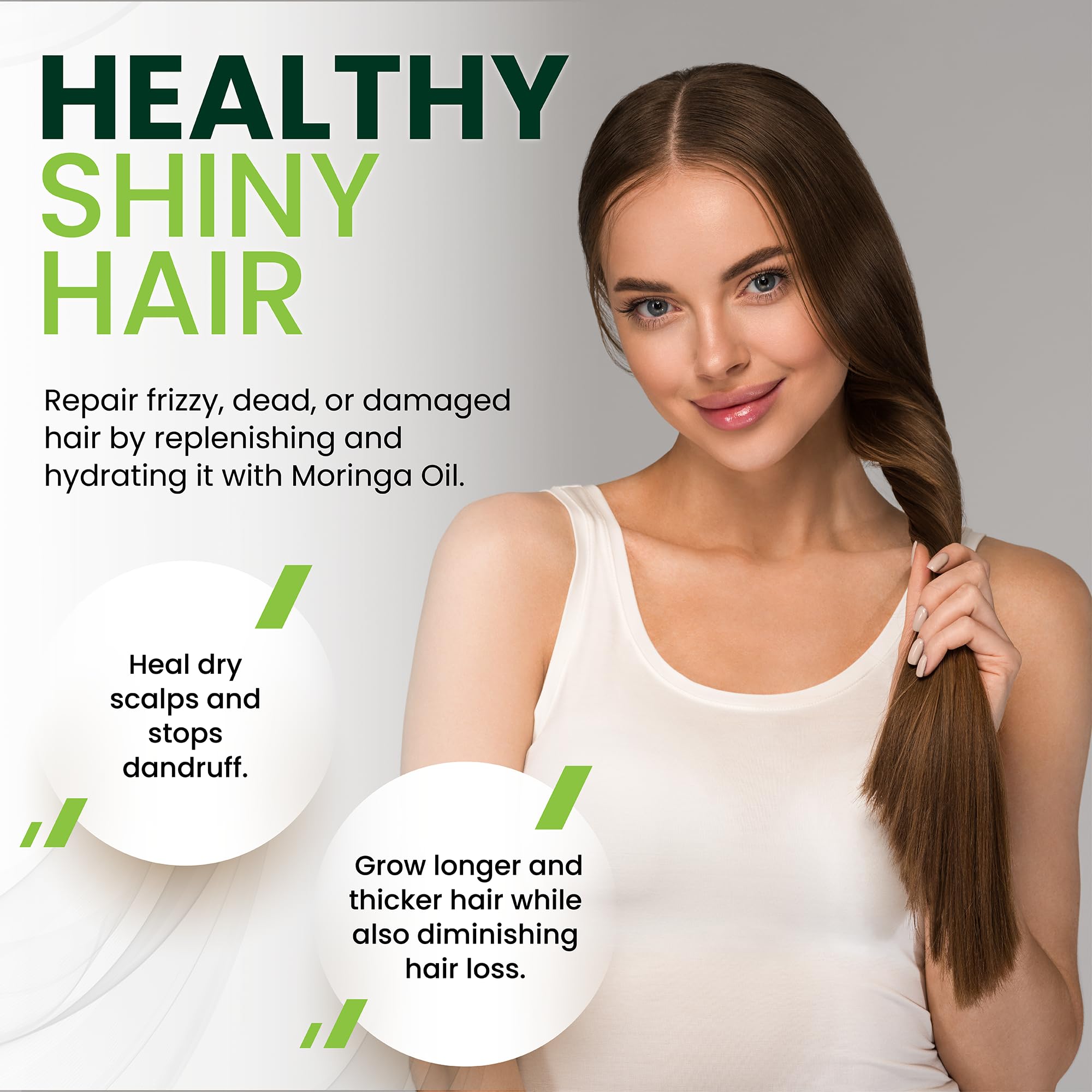 PURA VIDA MORINGA seed oil massaged into hair tips for shine.