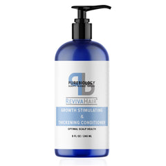 Pure Biology hair conditioner bottle close-up showing volumizing formula for fine and damaged hair