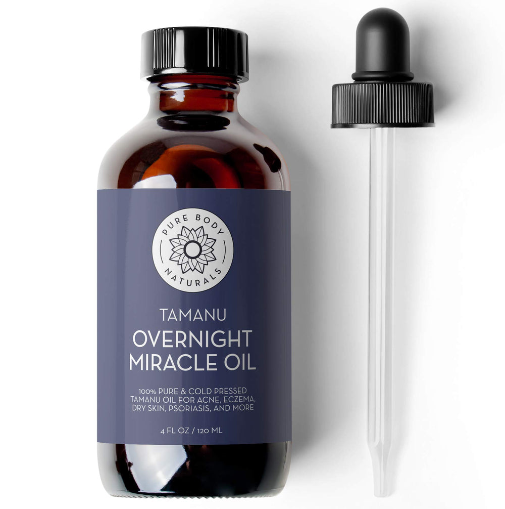 Pure Body Naturals Tamanu Oil bottle closeup highlighting a premium, cold-pressed formula for soothing skin.