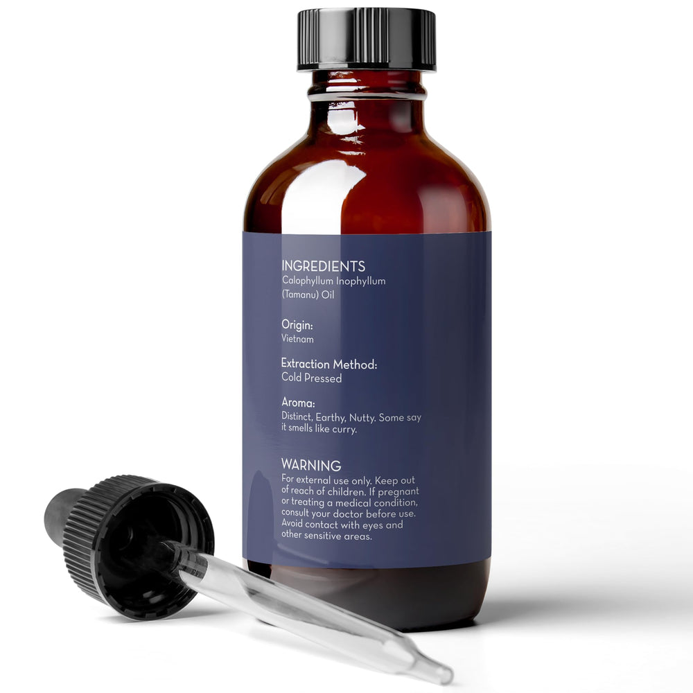 Pure Body Naturals Tamanu Oil green color bottle emphasizes natural, earthy profile.