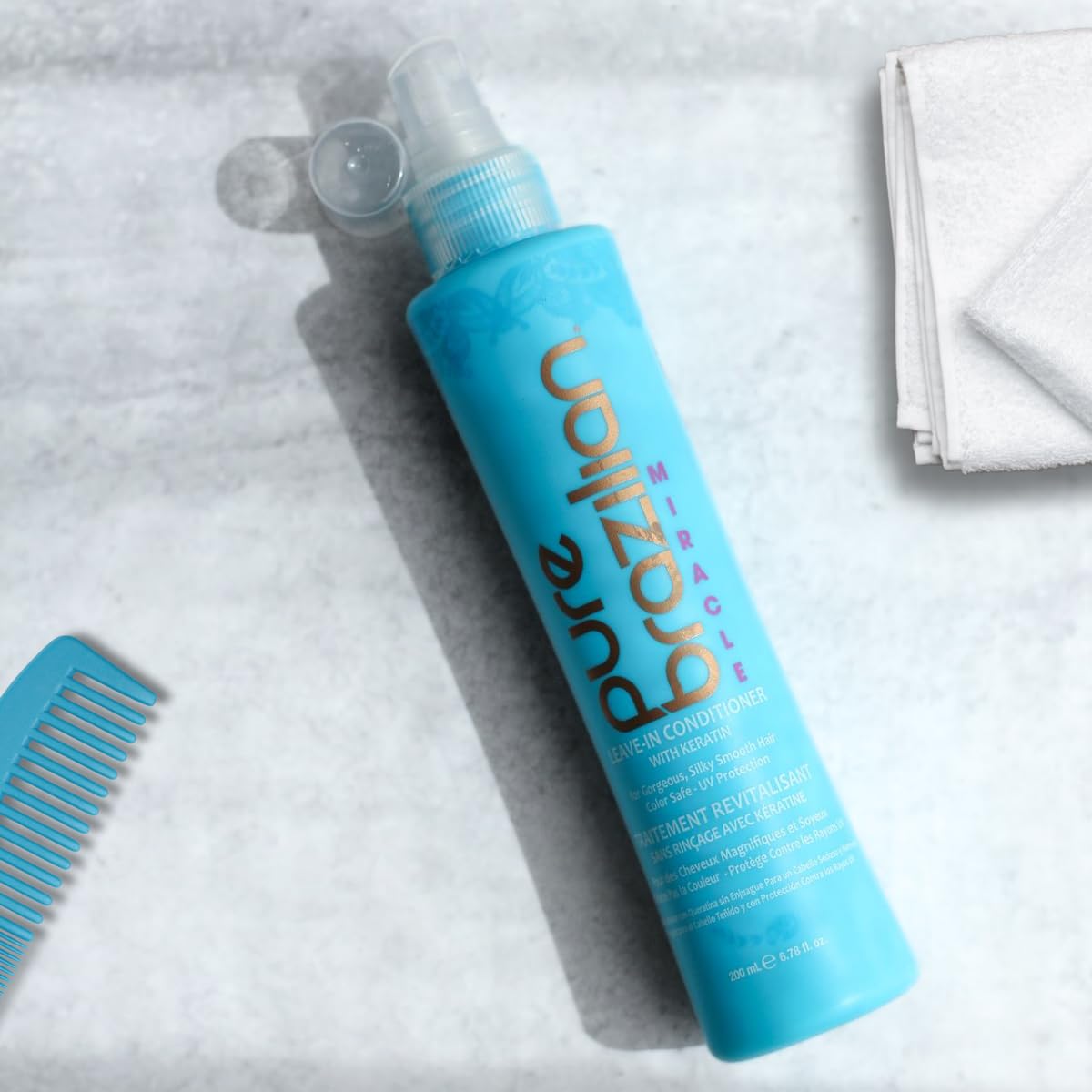 Pure Brazilian Leave-In Conditioner demonstrating frizz control for glossy hair.