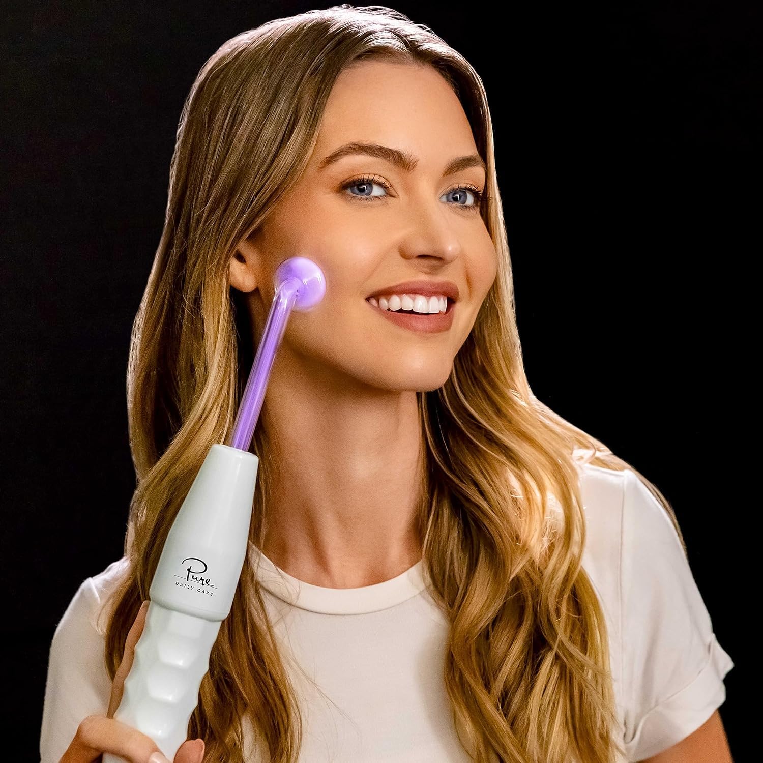 Pure Daily Care comb wand with tungsten energizes scalp and hair