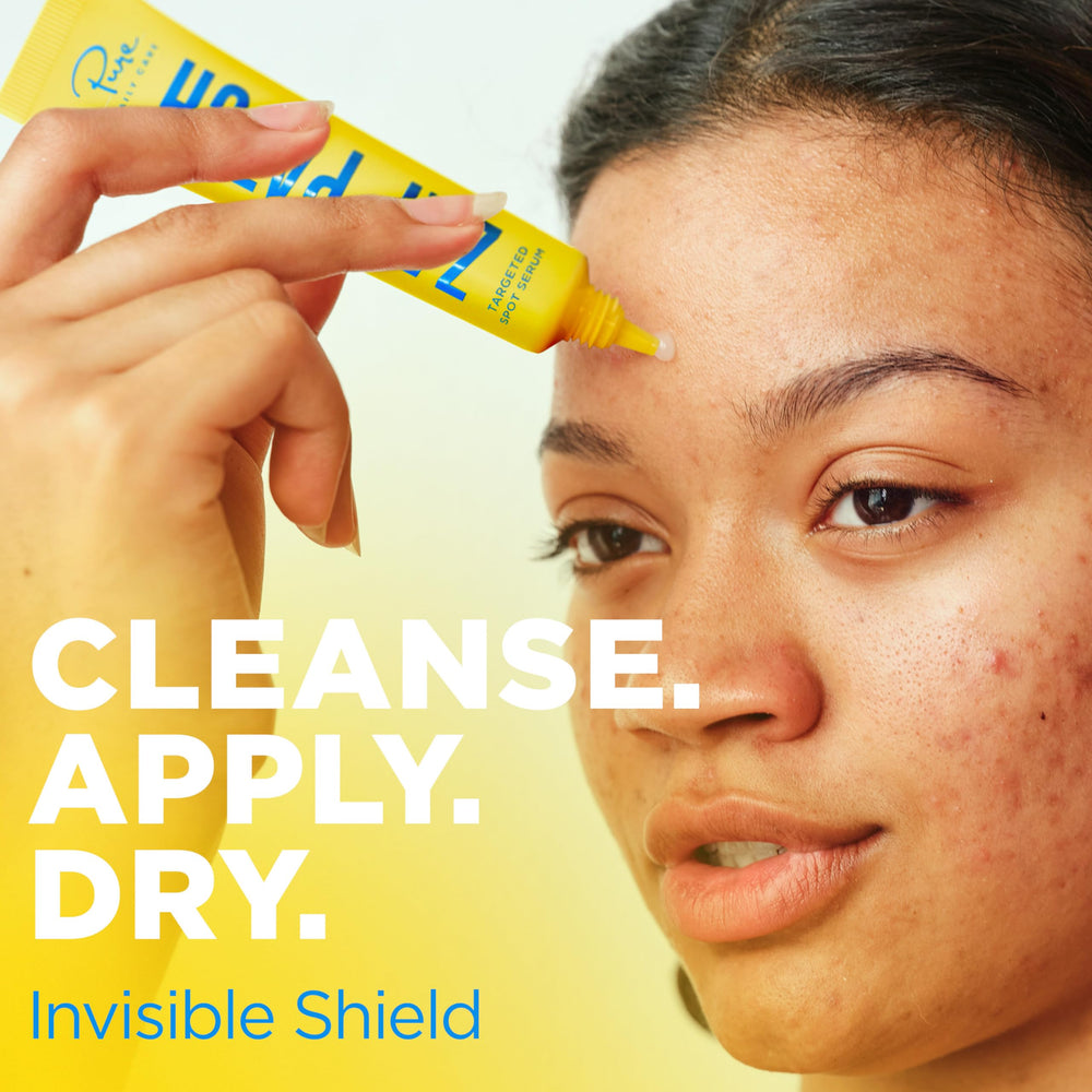 Pure Daily Care Zap Patch being dabbed on a blemish for targeted day treatment.